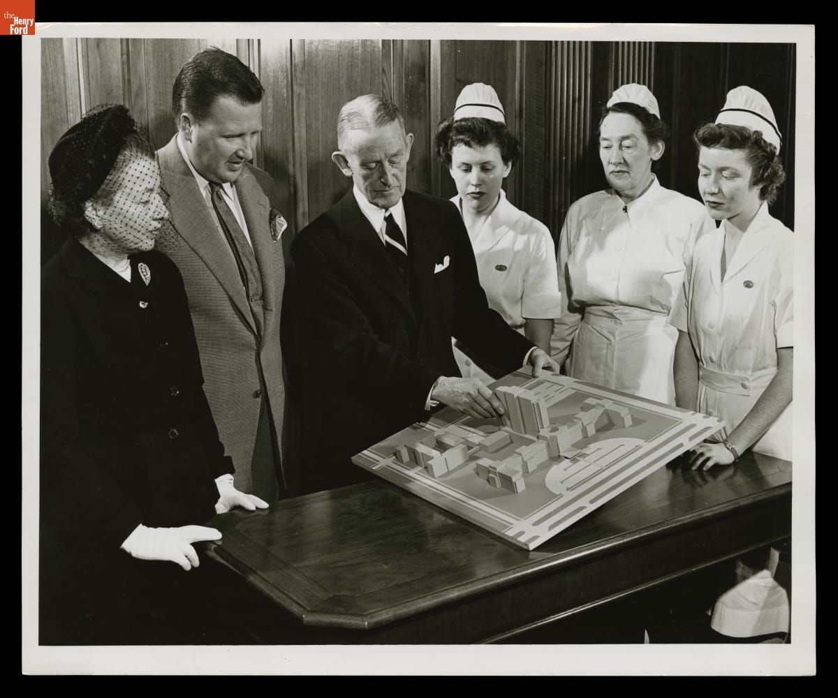 Eleanor Ford and Henry Ford II Viewing a Model of a Planned Annex to Henry Ford Hospital, February 1950