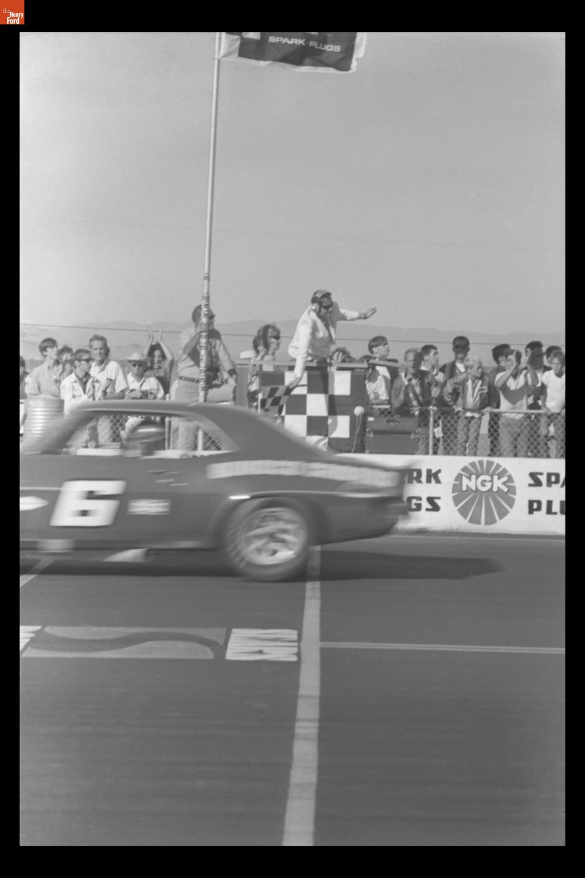 Mark Donohue Crossing Finish Line at Sears Point Trans-Am Race, September 1969