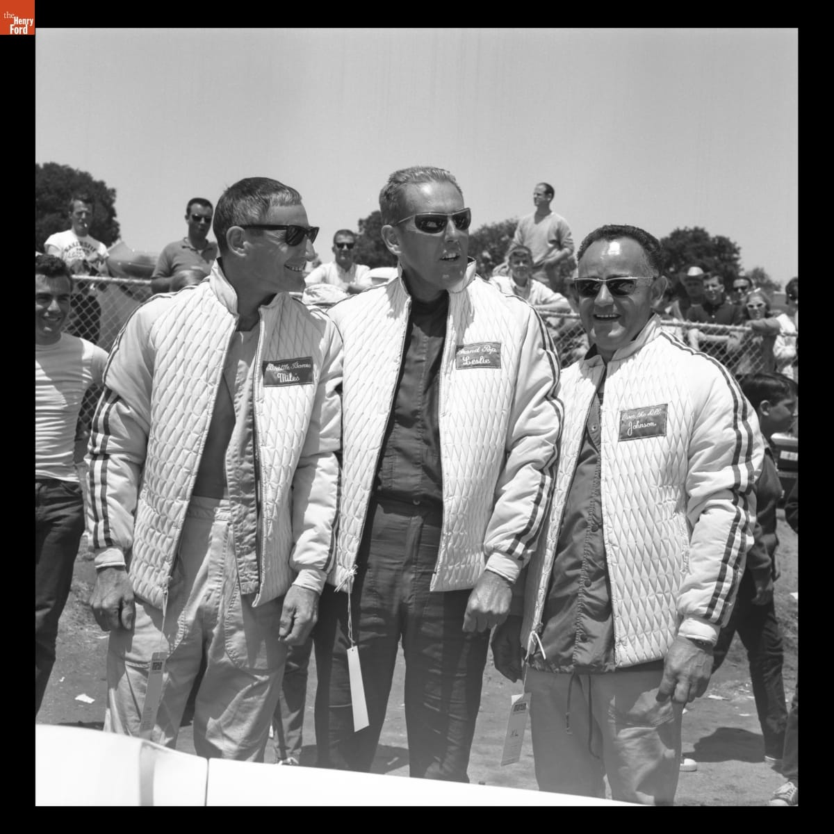 Ken Miles, Ed Leslie, and Bob Johnson Wearing "Old Folks Racing Team" Jackets at the U.S. Road Racing Championship, Laguna Seca, Monterey, California, May 1965