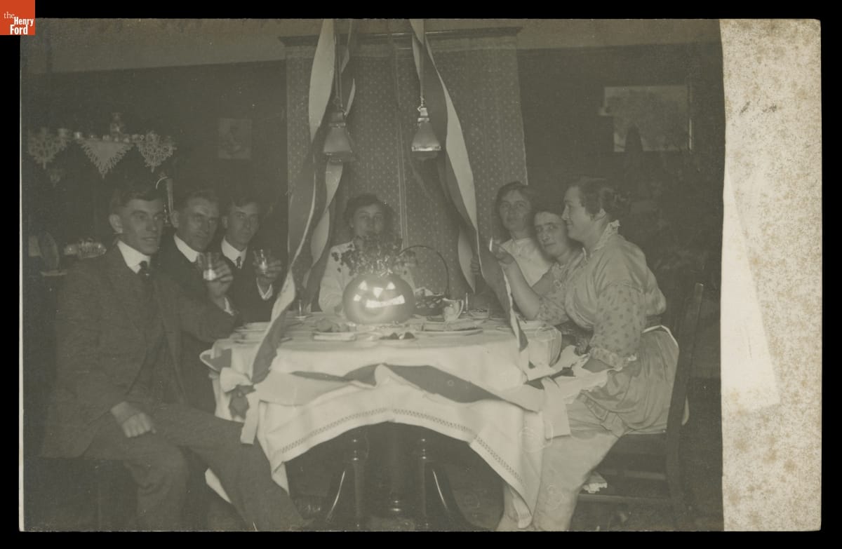Photographic Postcard Showing a Halloween Dinner Party about 1910-1915