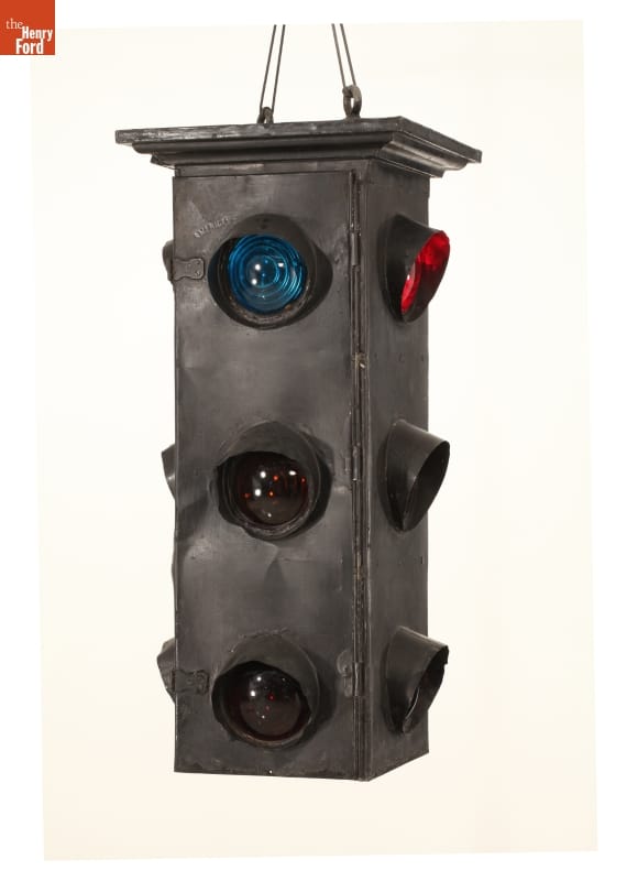 William L. Potts’s 1920 four-direction traffic signal with vertically arranged red, amber, and green lenses.