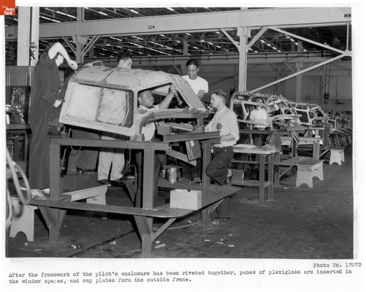 Workers Assembling a B-24 Pilot's Enclosure at the Ford Motor Company Willow Run Bomber Plant, June 29, 1942