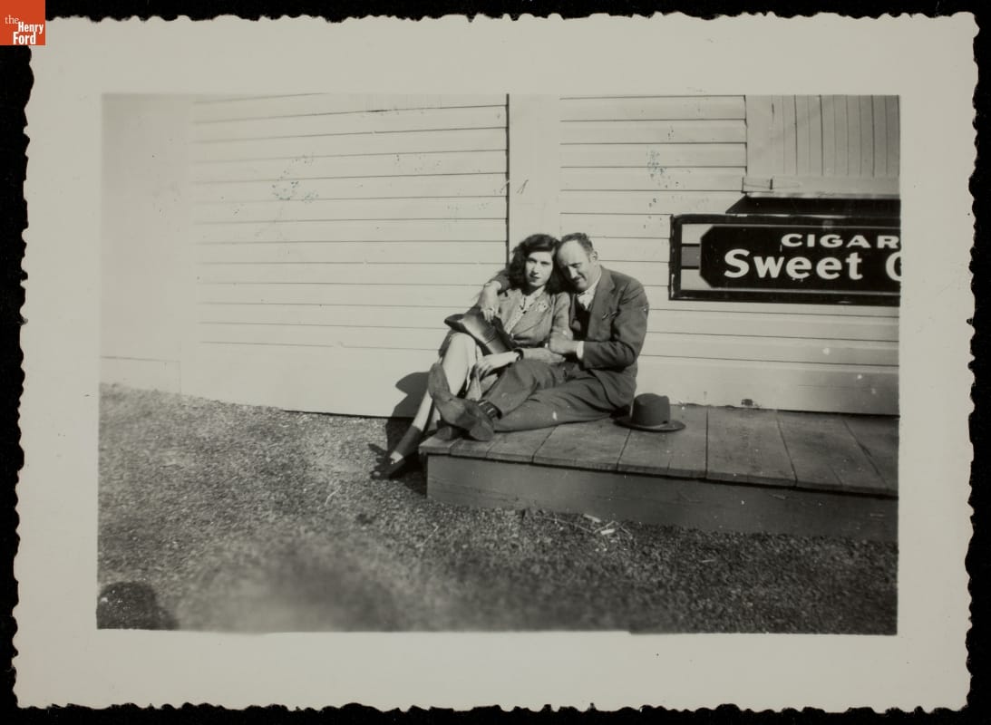 Tourists Posing near Cigar Sign, circa 1950