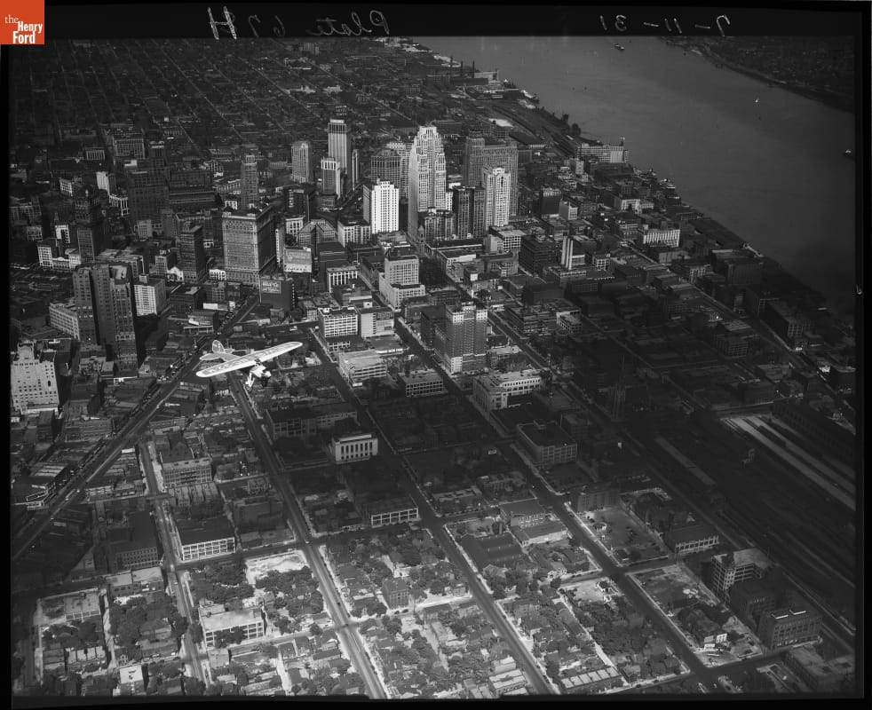 Detroit News--Airplane--Lockheed Vega--Over Detroit News Building--Item1