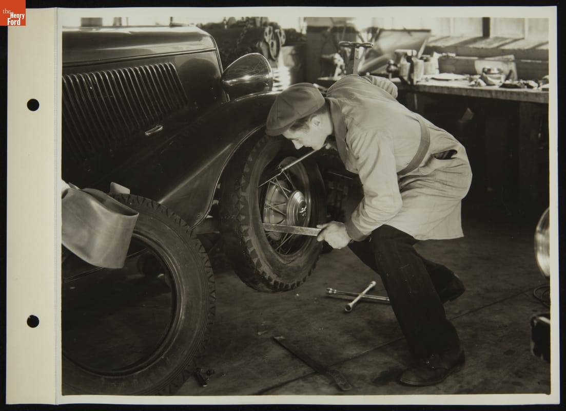 Attendant Changing Tire, March 1935