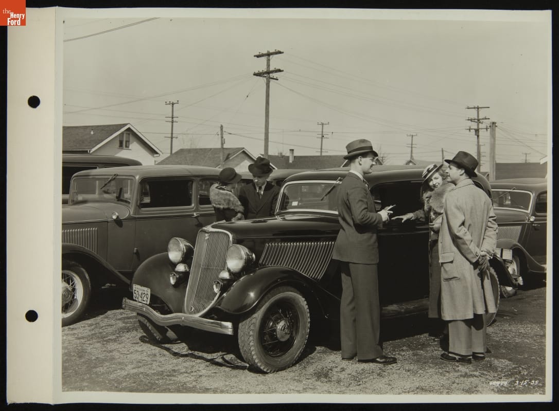 Salesman and Customers at Used Car Lot, March 1935
