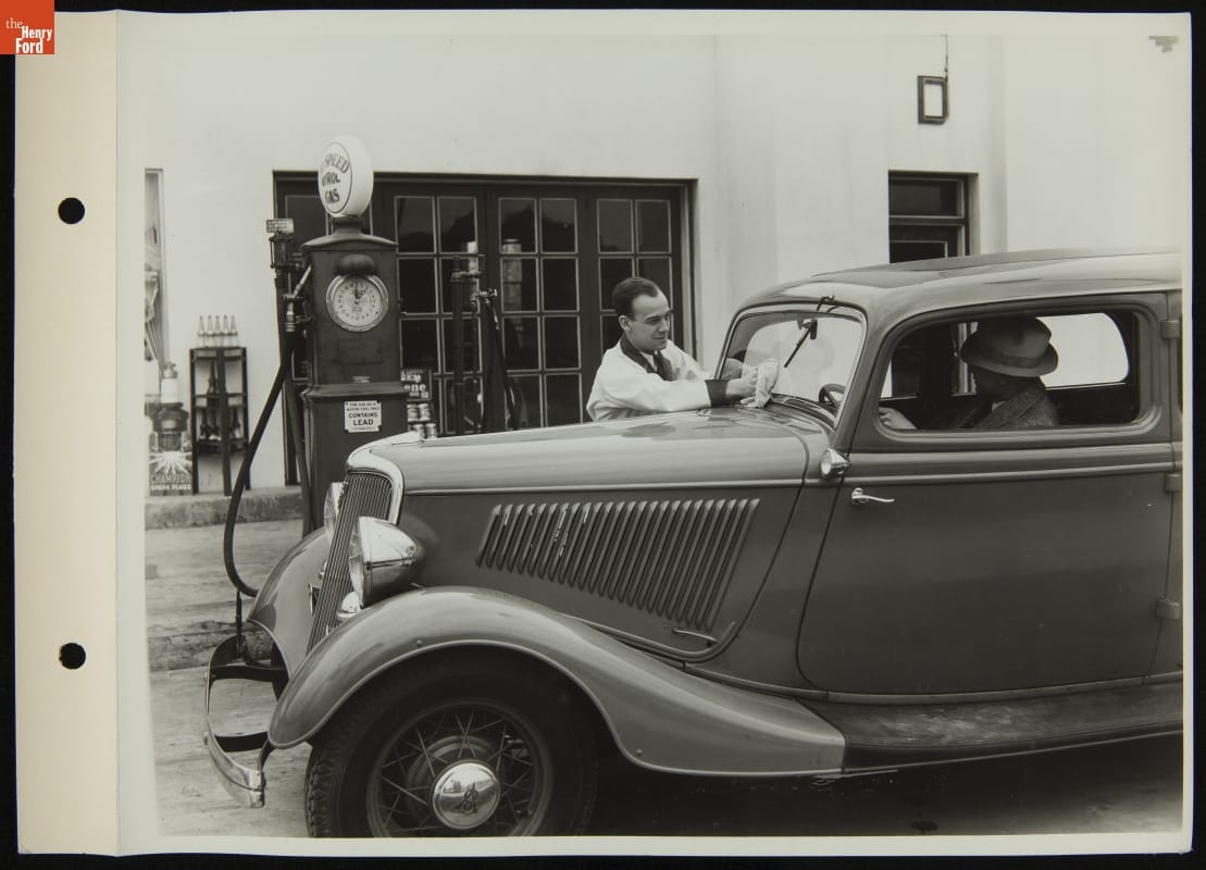 Ford Service Attendant Cleaning Ford V-8 Car Windshield, April 1935