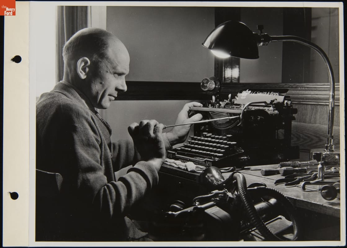 Telephone Department Employee Repairing a Typewriter at the Ford Rouge Plant, March 1937