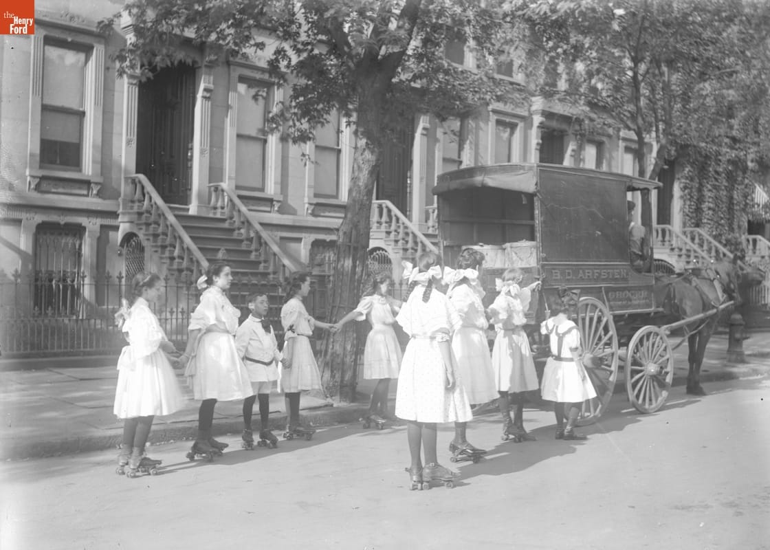 Children, Girls Roller Skating behind Grocery Wagon, 1890-1915