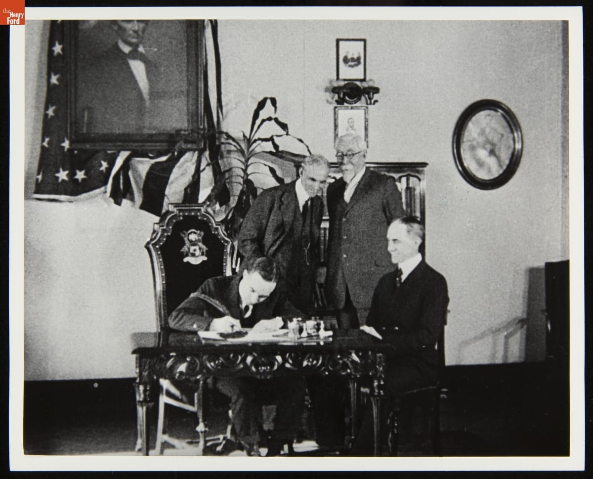 Edsel Ford, Henry Ford, Henry Leland, and Wilfred Leland at the Acquisition of Lincoln Motor Co. by Ford Motor Co., 1922