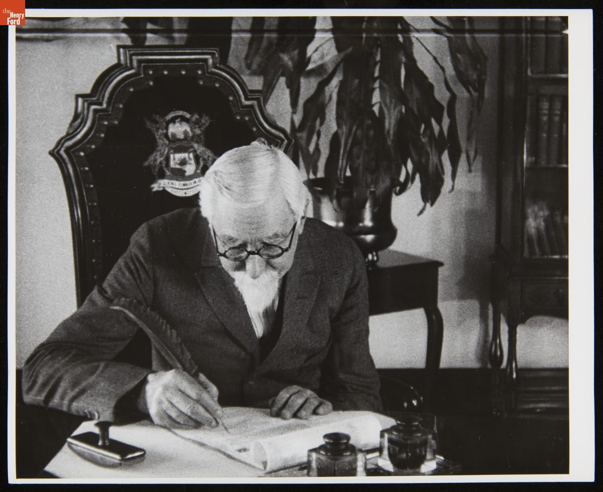 Henry Leland Signing Papers at the Acquisition of Lincoln Motor Co. by Ford Motor Co., 1922