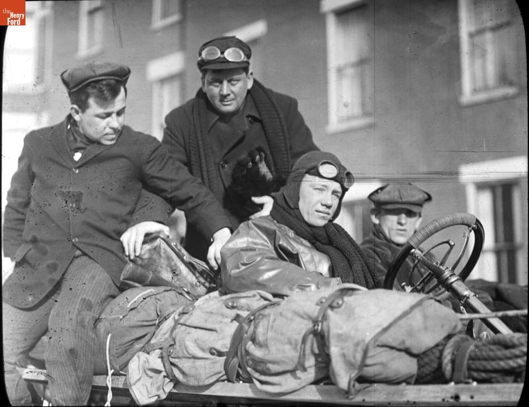 Roberts, Schuster, Miller and Williams Sitting in the Thomas Flyer, New York to Paris Race, 1908