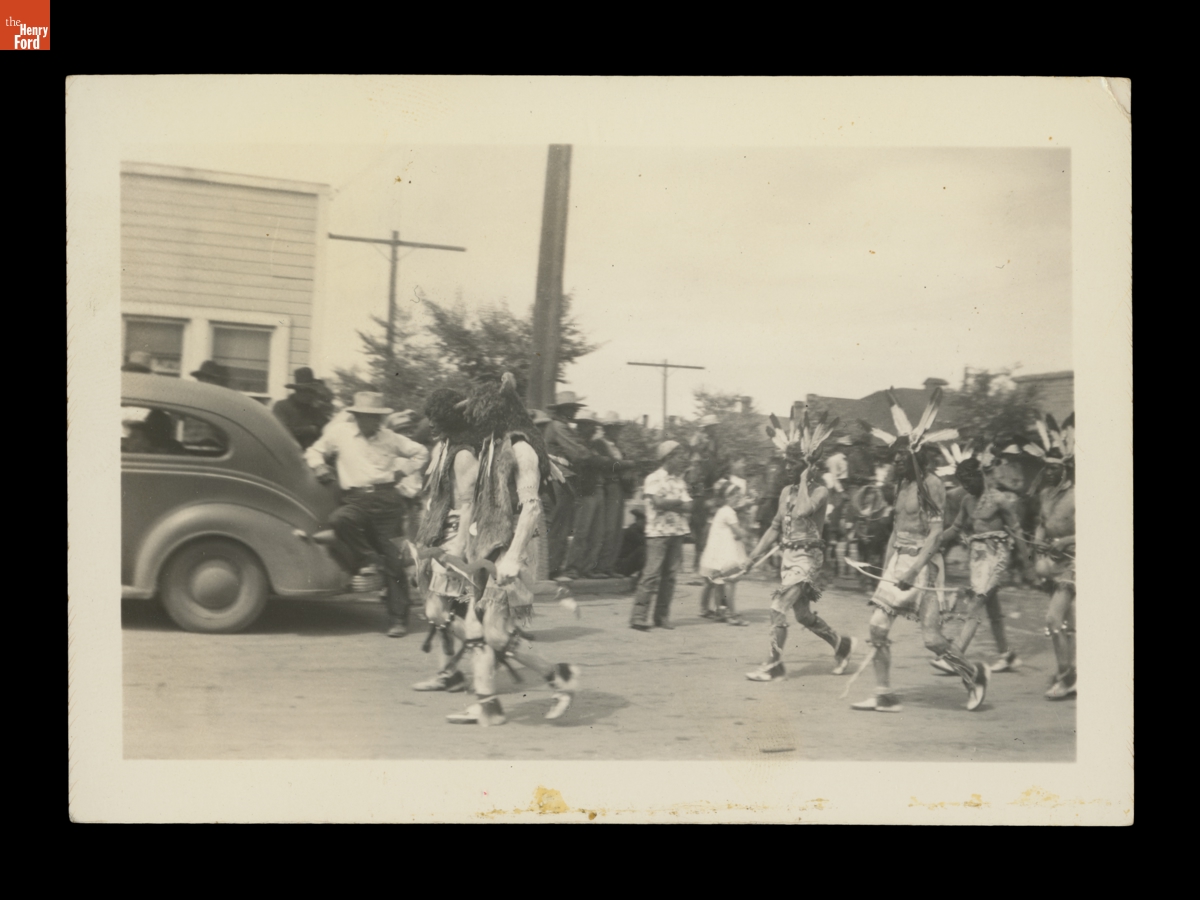 Indigenous People in Parade on a City Street, Likely Part of the Gallup Inter-Tribal Ceremonial, 1941