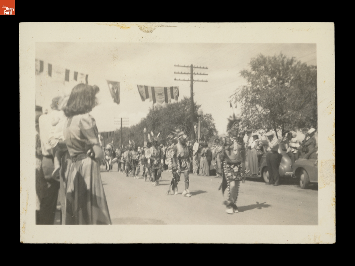 Indigenous People in Parade on a City Street, Likely during the Gallup Inter-Tribal Ceremonial, 1941