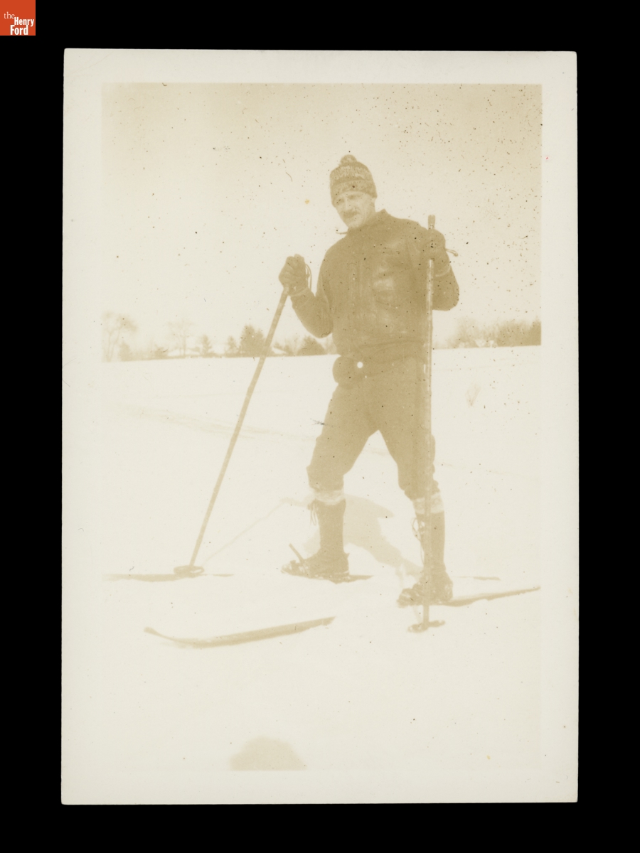 Gilbert Rohde Wearing Skis and Winter Clothing