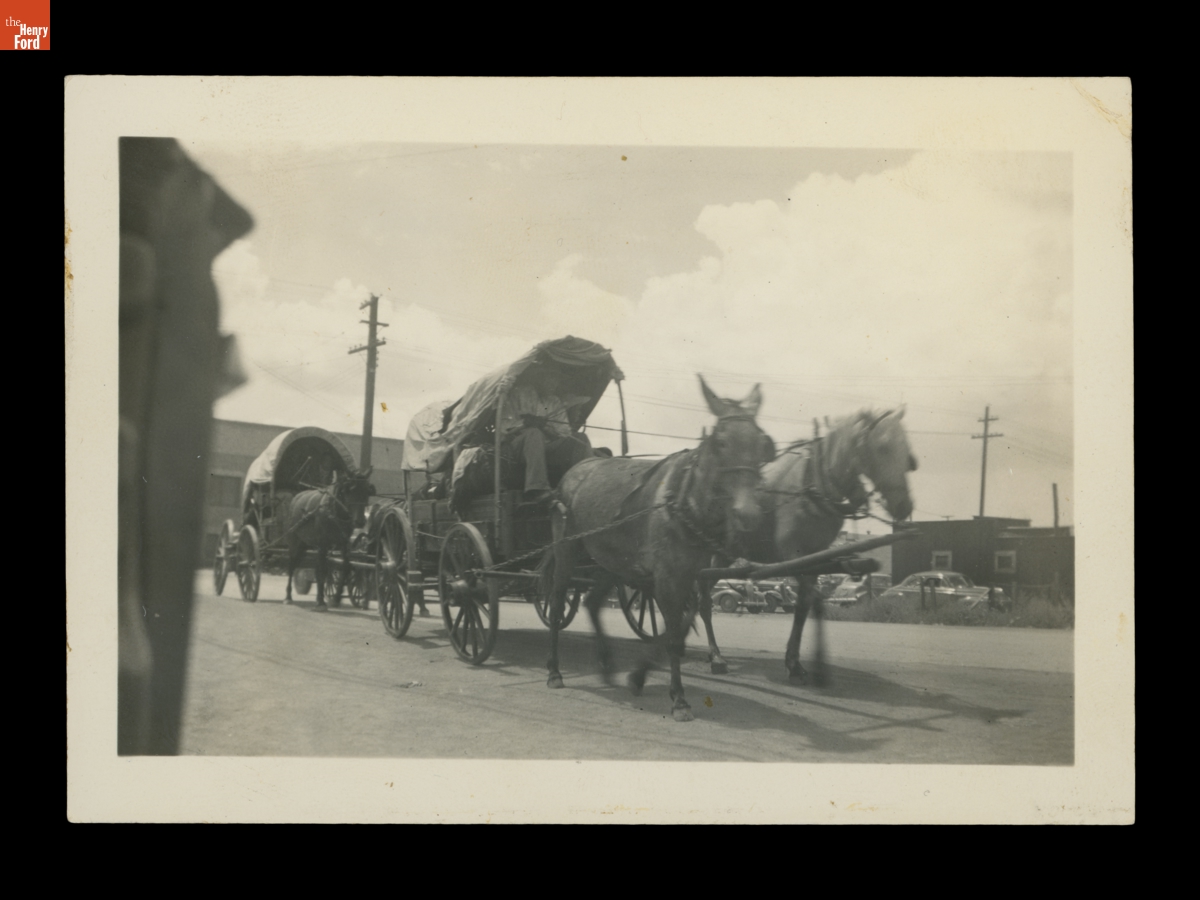 Covered Wagons on a City Street, Likely Part of the Gallup Inter-Tribal Ceremonial, 1941