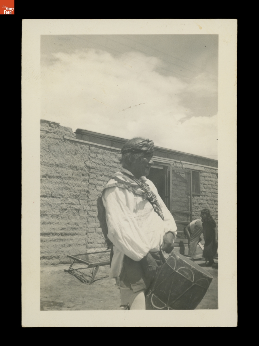 Indigenous Man in Traditional Clothing Holding a Drum Likely Part of the Gallup Inter-Tribal Ceremonial, 1941