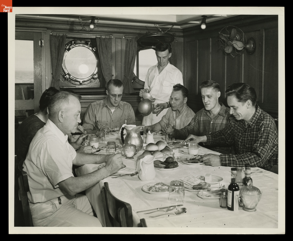 Crew of the Benson Ford Freighter around the Dining Room Table, April 14, 1945