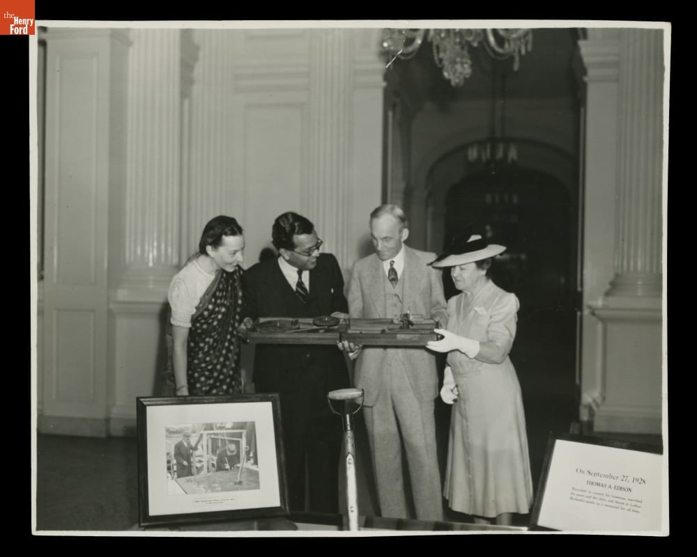 Mr. T. A. Raman Presents a Portable Spinning Wheel to Henry Ford, a Gift from Mahatma Gandhi, 1942